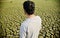 Man standing around a dried soil surface land