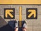 Man Standing Arrow Direction Sign Choice Left and Right