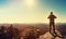 Man standing at the edge of a cliff overlooking the mountains