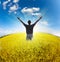 Man standing on field under blue sky