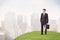 Man standing in front of city landscape