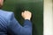 Man Standing In Front Of The House Knocking The Door