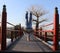 A Man Standing on his Head on a Japanese Bridge