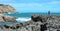 A man standing on the rock in Lombok island, Indonesia