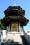 Man stands in front of Buddha. Peace Pagoda, Battersea, London. UK