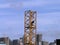 Man stands inside Crane tower as it is built