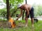 Man starting a cooking fire in a campsite