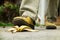 Man stepping on banana peel