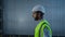 Man storehouse employee walking at package distribution shipment storage