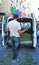 Man on the streets distributing rosemary, Corpus Christi in Triana, Seville, Spain