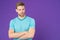 Man strict handsome unshaven guy on violet background. Masculinity concept. Man with muscular arms confident and strong