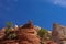 Man stting on top of layered cross beds of aeolian Navajo sandstone rock formations on Zion National Park, Utah, USA