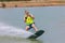 Man study wakeboarding on a blue lake