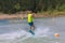 Man study wakeboarding on a blue lake