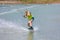 Man study wakeboarding on a blue lake