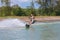 Man study wakeboarding on a blue lake