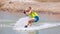 Man study wakeboarding on a blue lake