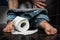 Man suffers from diarrhea is sitting on toilet bowl