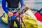 Man sufrers in wetsuits with kite equipment