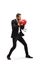 Man in a suit with boxing gloves in a guard position