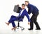 Man in suit or businessman pushing office chair