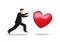 Man in suit chasing a giant heart.
