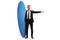 Man in a suit holding a surfing board and pointing to the side