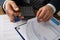 Man in suit prepares document for rental property