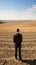 A man in a suit standing in a field. Generative AI image.