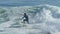 Man Surfing a Wave in California in Slow Motion