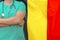 Man surgeon or doctor with stethoscope on the background of the Belgium flag. Health care, surgery and medical concept in Belgium