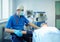 Man surgeon at work in operating room