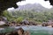 Man swimming in Nuoc Mooc lake, romantic and peaceful scenery