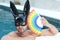 Man in swimming pool with sexy bunny mask and rainbow flag