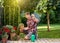 Man taking care of plants in garden