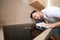 Man taking closer look at surface of cooker under cleaning