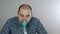 A man taking inhalation. Use a nebulizer and inhaler for treatment. Sick person inhales through inhaler mask. Quarantine