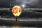 Man taking lamp balloon with dramatic ocean, lightning and light