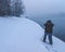 Man taking a photo of snow storm