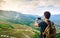 Man taking picture of stunning Asian rice terrace landscape