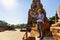 A man taking a selfie with a mobile phone in Ayutthaya`s old town. Young caucasian happy smiling tourist man taking selfie with