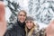 Man Taking Selfie Photo Young Romantic Couple Smile Snow Forest Outdoor