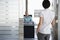 Man Talking To Woman Standing In Office Doorway