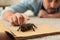 Man and tarantula on carpet. Arachnophobia fear of spiders