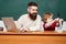 Man teacher play with preschooler child. Homeschooling. Teacher and schoolboy using laptop in class. Young or adult