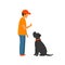 Man teaching a dog to stay and sit , basic commands obedience training