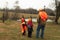 Man teaching sons how to deer hunt