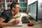 Man teleworking in front of the computer