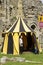 Man in tent. Medieval Display. Warkworth, Northumberland. England. UK.