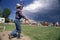 Man throwing horseshoe